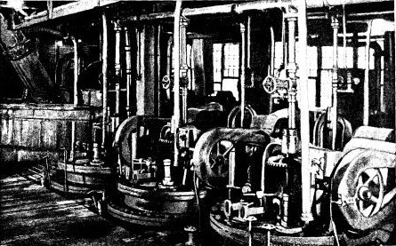 IN THESE MIXING VATS AT THE BUFFALO WORKS, ANILINE DYES
ARE PREPARED