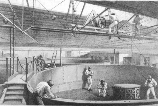 R. M. Bryson, lith from a drawing by R. Dudley

London, Day & Sons, Limited, Lith.

COILING THE CABLE IN THE LARGE TANKS AT THE WORKS AT GREENWICH.